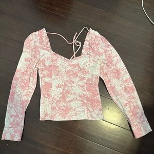Feminine pink top with slight puff sleeves
